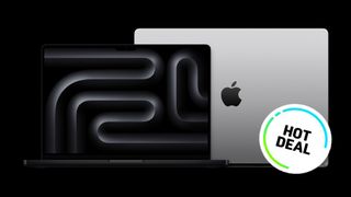 Two Apple MacBook Pro laptops on a dark background