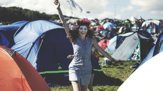 Best festival tents: Woman in a headdress at a campsite