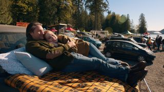 Jack and Mel lying on a car bonnet in Virgin River season 6