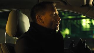 James Bond removing gloves in Skyfall