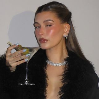 Hailey Bieber with natural brunette hair