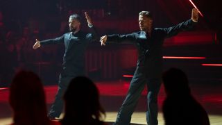 Mark Ballas and Derek Hough dancing the Argentine tango together during the Dancing With the Stars Season 33 finale.