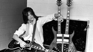 Joe Perry with a Gibson guitar and a B.C.Rich doubleneck backstage at the Boston Garden on November 27, 1978 in Boston, Massachusetts. 