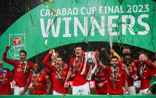 Manchester United celebrate winning the League Cup