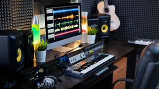 A well-organised home studio space centred around a tidy desk