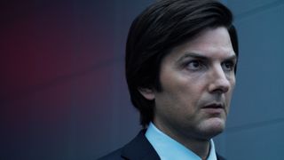 Head and shoulders shot of Adam Scott in Apple TV Plus&#039; &quot;Severance&quot; season 2