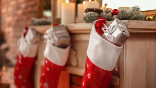 Stockings filled with gifts and hung for the holidays