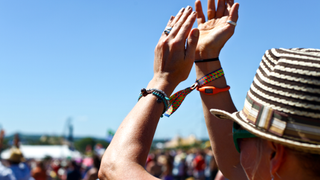 An individual attending Glastonbury festival