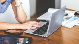 Woman using Windows laptop