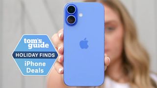 iphone 16 being held up by blonde woman with a holiday finds deal sticker