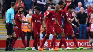 Liverpool players celebrate their ninth goal in a 9-0 win over Bournemouth in the Premier League in August 2022.