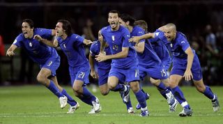 Italy players celebrate victory on penalties over France in the 2006 World Cup final.