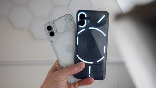 The Nothing Phone (2)&#039;s colorways with glyph lights on