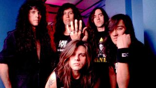 Testament posing for a photograph in 1990