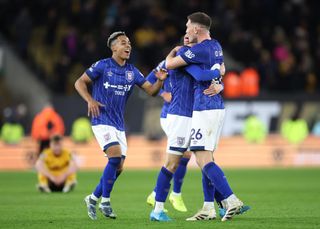 Ipswich Town celebrate their recent success against Wolverhampton Wanderers