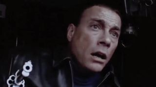 Jean Claude Van Damme with a gun