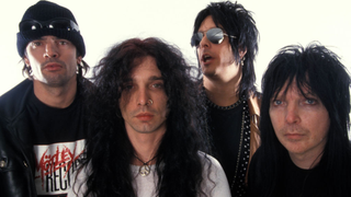 Mick Mars and John Corabi and Nikki Sixx and Tommy Lee of Motley Crue.