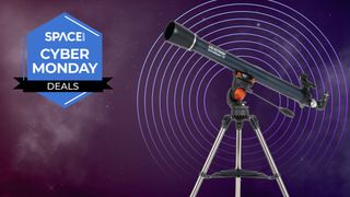 A Celestron AstroMaster 70AZ telescope, against a starry background with a sign that reads Space Cyber Monday Deals. 