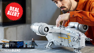 Man playing with Star Wars lego