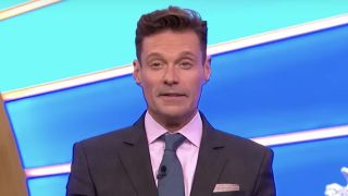 Ryan Seacrest hosting Wheel of Fortune