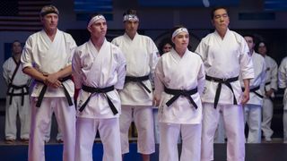 William Zabka as Johnny Lawrence, Tanner Buchanan as Robby Keene, Ralph Macchio as Daniel LaRusso, Mary Mouser as Samantha LaRusso, Yuji Okumoto as Chozen in Cobra Kai