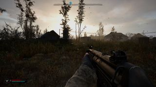 Aiming a gun into the sunrise in STALKER 2: Heart of Chornobyl