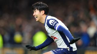 Son Heung-min celebrates after scoring directly from a corner for Tottenham against Manchester United in December 2024.