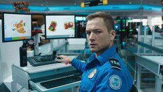 Taron Egerton as Ethan Kopek in &quot;Carry-On&quot; now streaming on Netflix