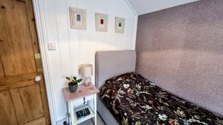 pink and plum tone single bedroom