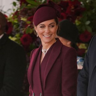 Kate Middleton wears a burgundy outfit