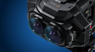 Close-up of the Blackmagic URSA Cine Immersive camera, against a blue background