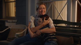 Mary and Sheldon hugging on the bench in Young Sheldon.