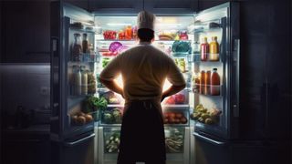 An image of a chef looking in a fridge that may be AI generated