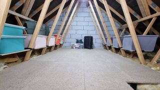 Loft of house with insulated and boarded floor providing space for storage