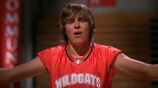 Troy Bolton (Zac Efron) sings in High School Musical