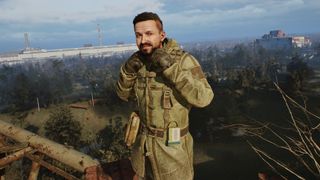 Stalker 2 screen - soldier standing on a structure overlooking the Chornobyl exclusion zone