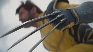 An action shot of Wolverine with his claws deployed