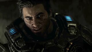 Gears of War E-Day release date: A close-up of Marcus Fenix with his face covered in blood during the Gears of War E-Day trailer. 