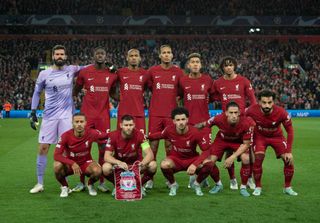 LIVERPOOL, ENGLAND - NOVEMBER 01: The Liverpool team line up, back row l-r, Alisson Becker, Ibrahima Konate, Fabinho, Virgil van Dijk, Roberto Firmino, Trent Alexander-Arnold, front row l-r, Thiago Alcantara, James Milner, Curtis Jones, Konstantinos Tsimikas, Mohamed Salah during the UEFA Champions League group A match between Liverpool FC and SSC Napoli at Anfield on November 1, 2022 in Liverpool, United Kingdom. (Photo by Visionhaus/Getty Images)