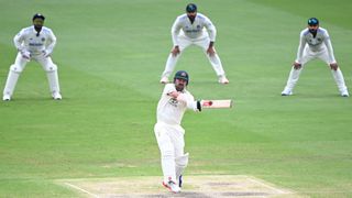 Travis head plays a pull shot with the Indian slips in the background.