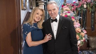 Melody Thomas Scott and Eric Braeden smiling on set of The Young and the Restless