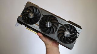 RTX 4070 Ti held by a masculine hand