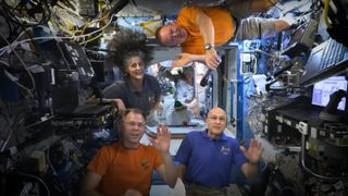 The four NASA astronauts currently living on the International Space Station — clockwise from bottom left, Nick Hague, Suni Williams, Butch Wilmore and Don Pettit — send a Thanksgiving message down to Earth on Nov. 26, 2024.