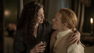 Claire (Caitríona Balfe) and Jamie (Sam Heughan) embrace each other in Outlander season 7 part 2