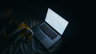 Laptop in the dark with Gmail open