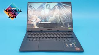 Asus TUF A14 gaming laptop on a blue background