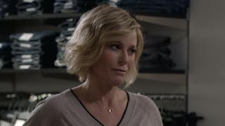 Claire Dunphy in a clothing store with Alex and Gloria in Modern Family Season 10