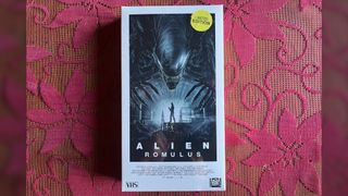 Front cover art for &quot;Alien: Romulus&quot; on VHS