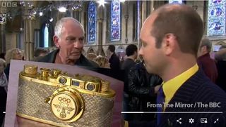 Grab of Antiques Roadshow with gold nazi leica camera on