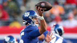 Tommy DeVito #15 of the New York Giants passes the ball ahead of the Giants vs Cowboys Thanksgiving Day NFL match, Nov. 28 2024